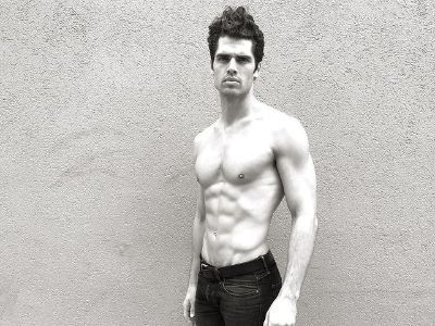 Brian Shimansky is shirtless, showing his ripped body.